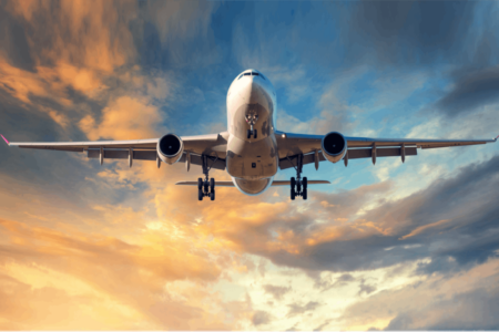 Airplane flying through a sunset sky - Skytrax Airline Awards 2018 - World's Best Airlines 2018