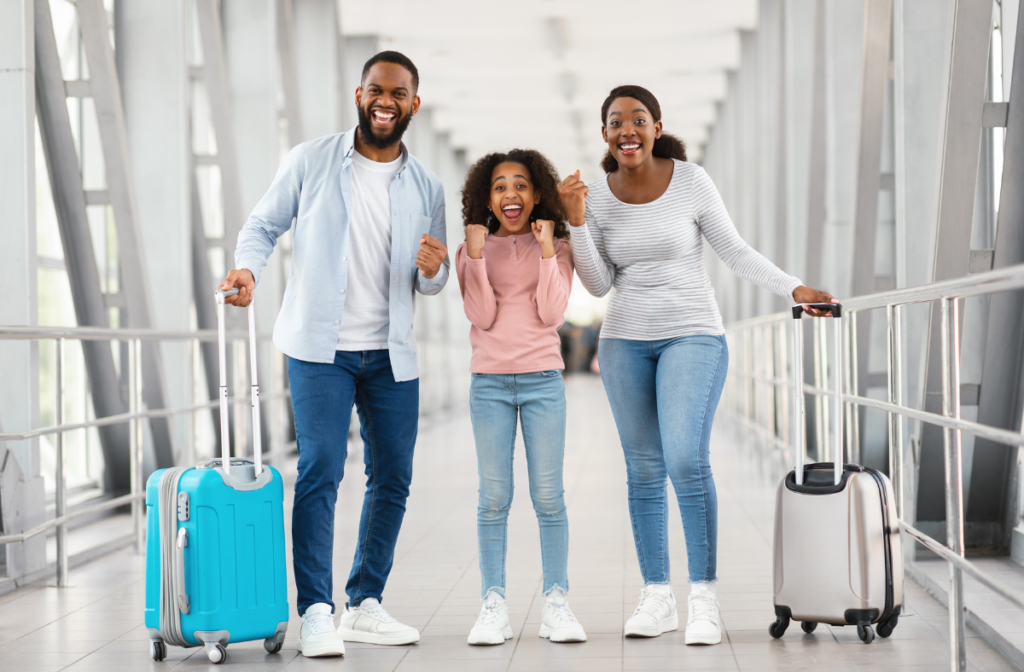 A group of happy travelers with luggage, ready for their adventure with ASAP Tickets