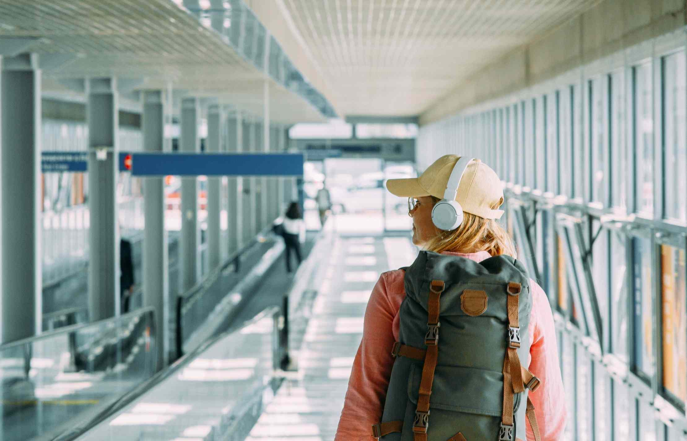 Woman at airport on a domestic flight