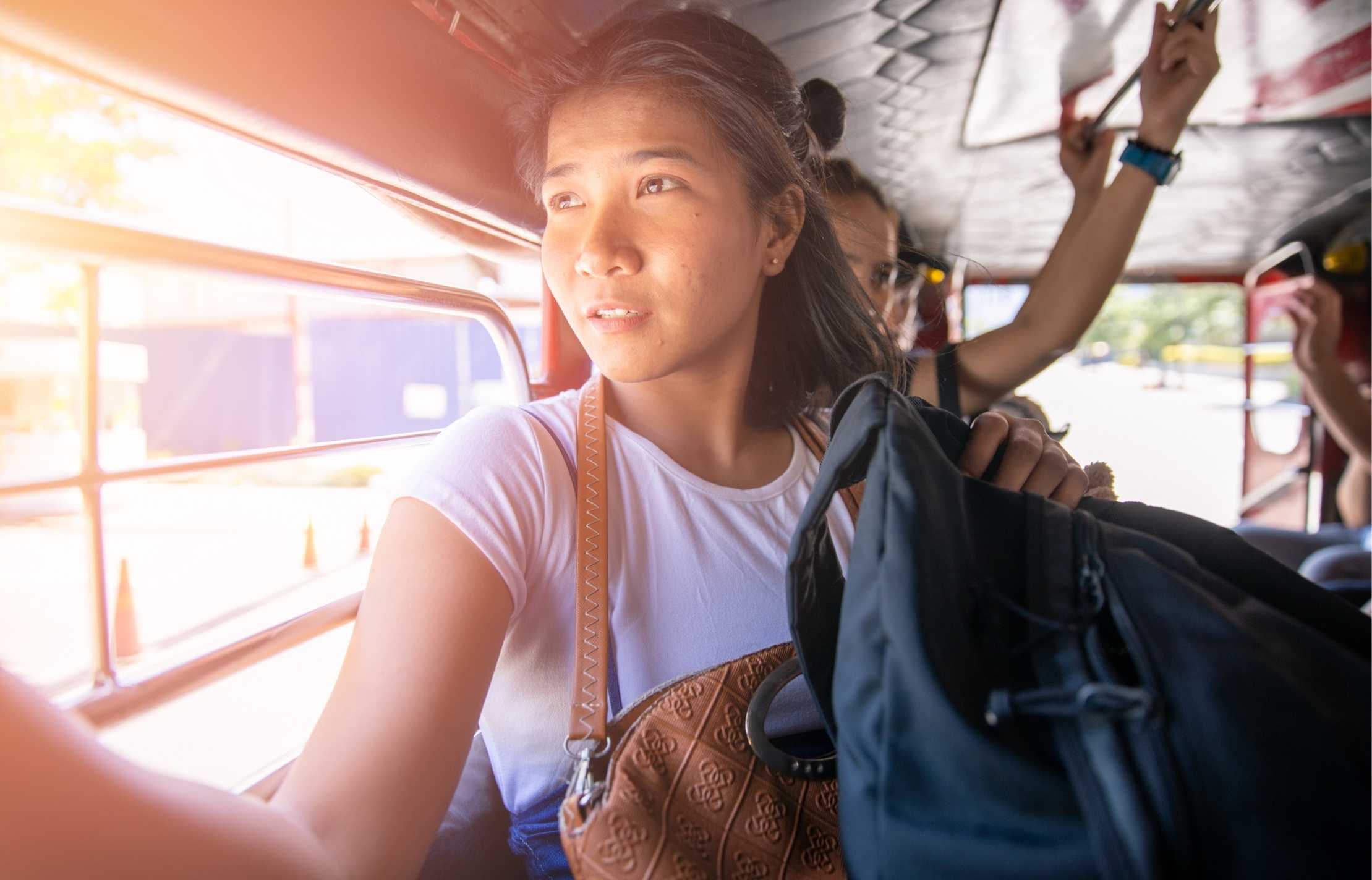 Filipino woman in a jeepney