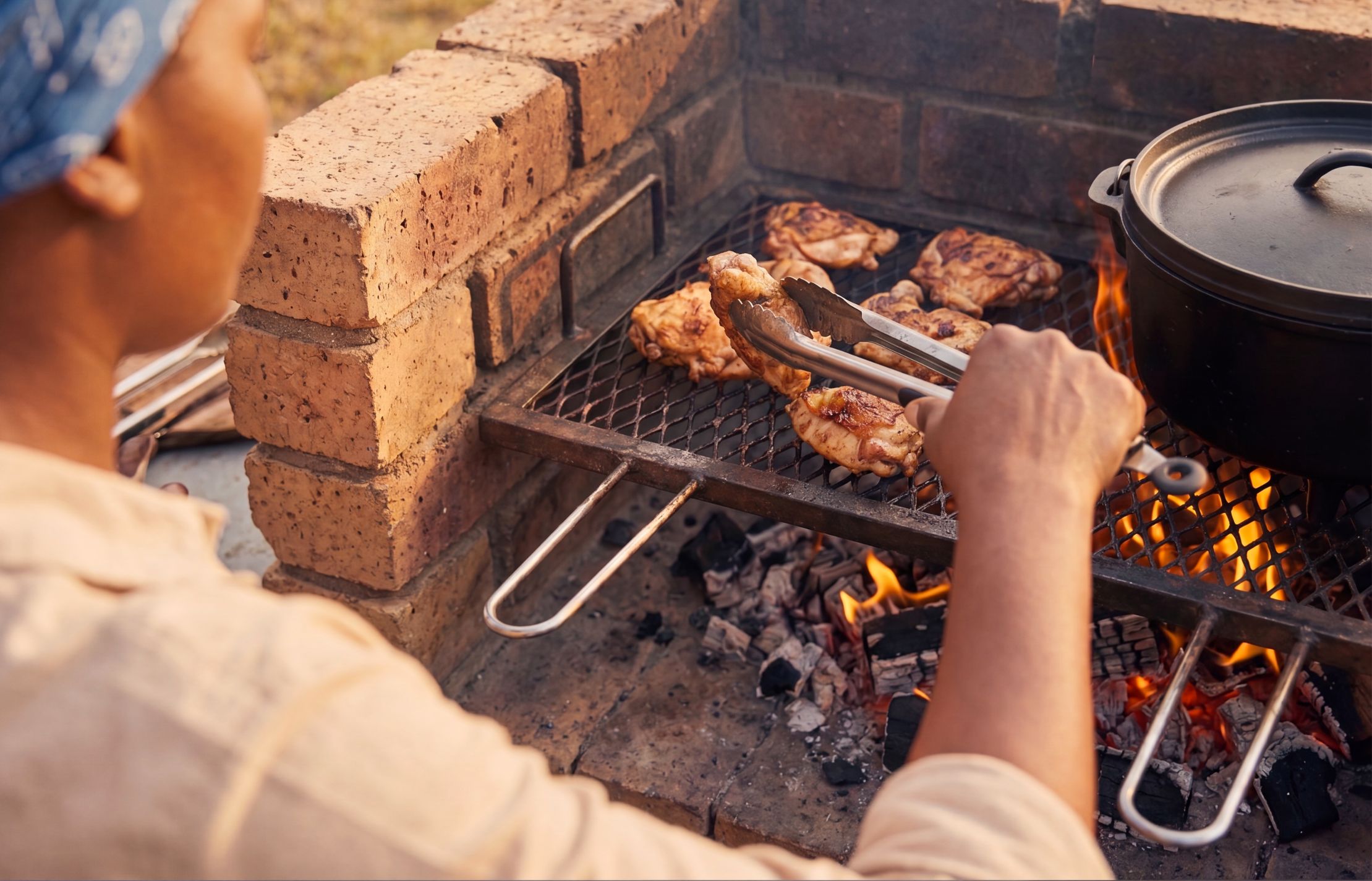 Woman cooking braai
